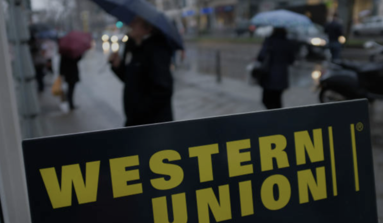 Emigrants, Banks, and the Remittance Tax: How Much Does Being Unbanked Cost? 